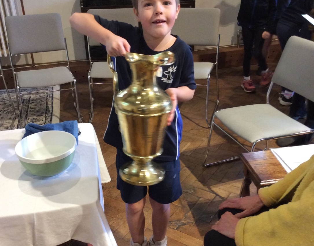 Year 3 pupil learning about Church artefacts.